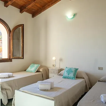 Апартаменты Vista Mare-isola Tavolara E Solarium Panoramico